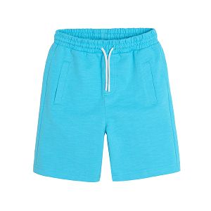 Light blue shorts with adjustable waist and side pockets