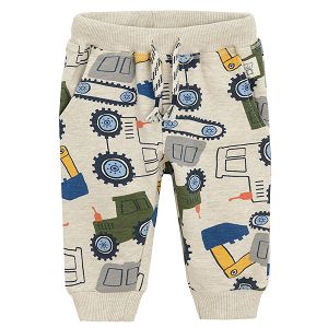 Ecru jogging pants with trucks print