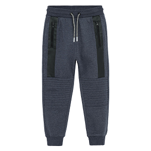 Blue jogging pants with cord on the waist