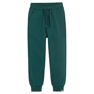 Green jogging pants