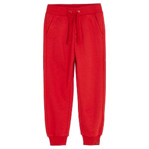 Red jogging pants