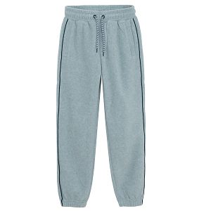 Grey fleece jogging pants with blue line on the side