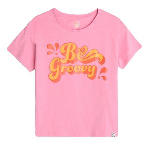 Pink short sleeve blouse with BE GROOVY print
