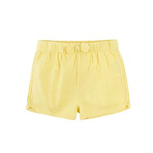 Yellow shorts with elastic waist and bow