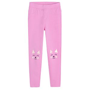 Pink jeggings with cats print on the knees
