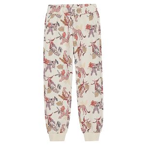 Beige jogging pants with wild animals and nature print