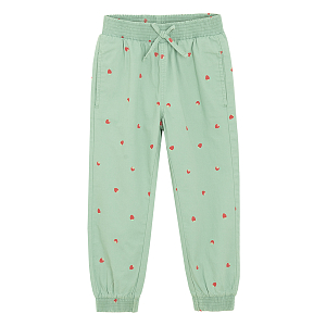 Green sweatpants with strawberries print