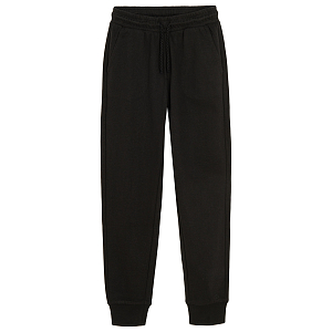 Black sweatpants with elastic on the ankles and cord