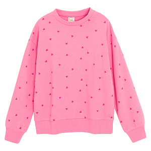 Pink sweatshirt with red hearts print