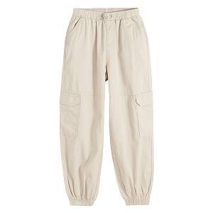 Beige wide pants with side pockets