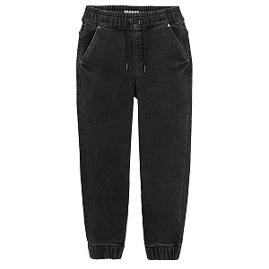 Dark grey denim jeans with elastic ankles and cord