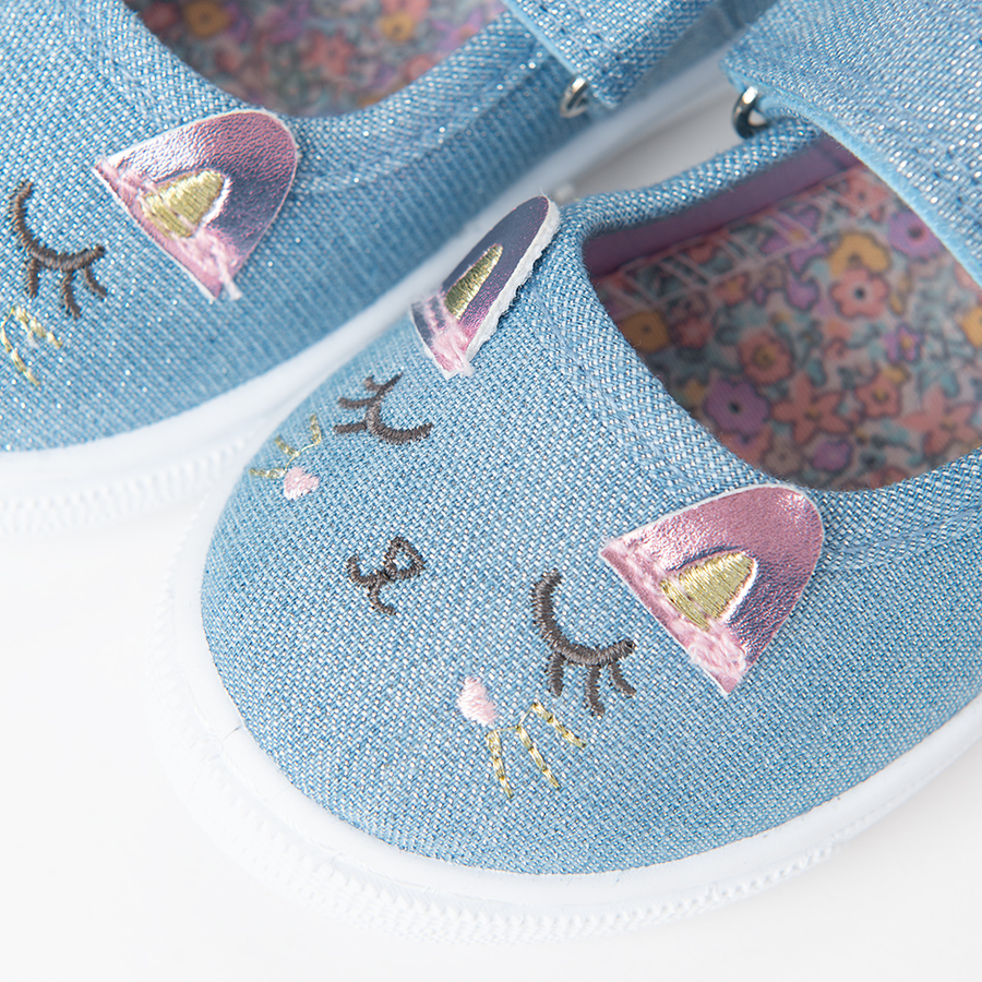 Blue shoes with kitten pattern