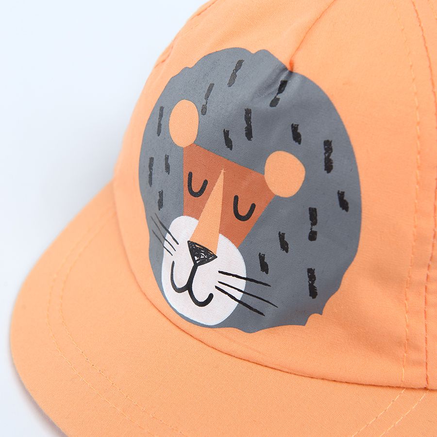 Orange cap with lion print