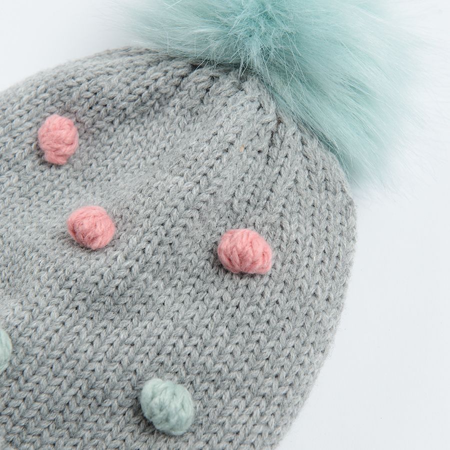 Grey melange cap with pom poms