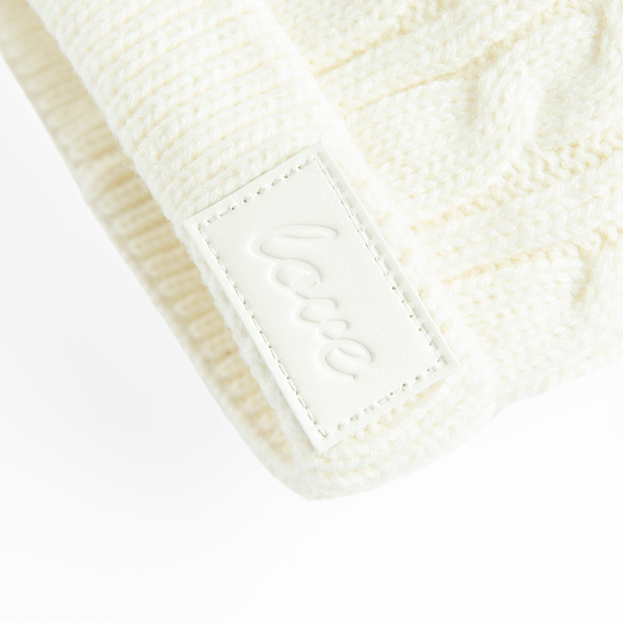 White winter beanie with pom pom
