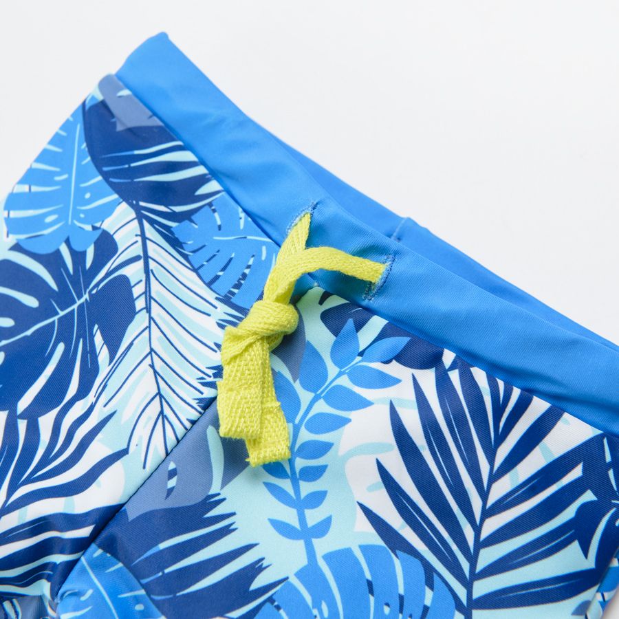 Blue swimming trunks with tropical leaves