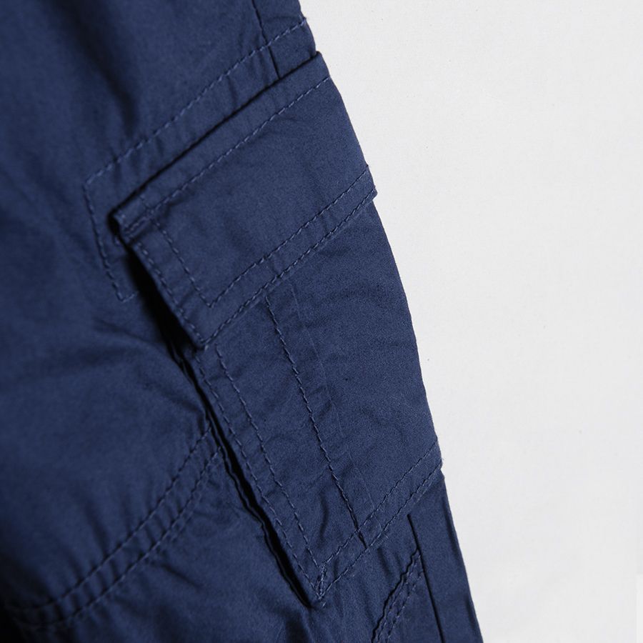 Blue trousers with elastic waist and pockets