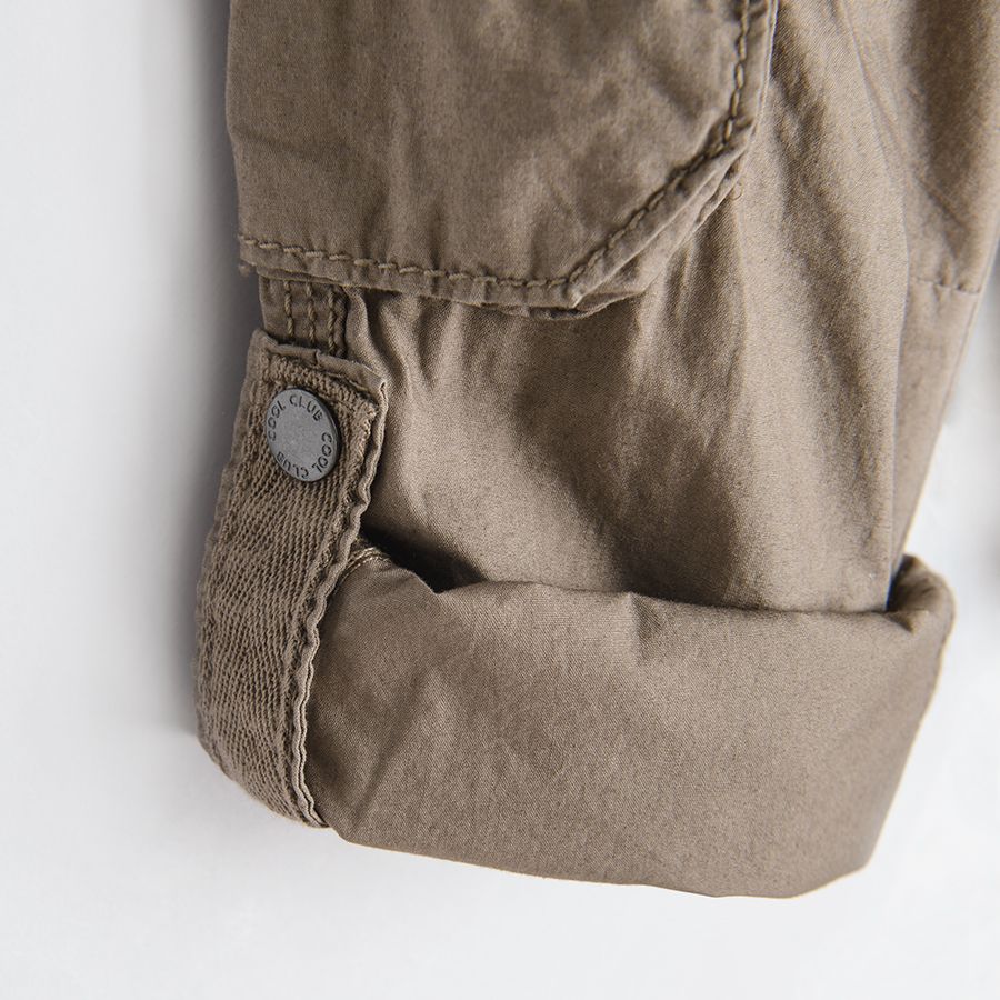 Brown trousers with external pockets