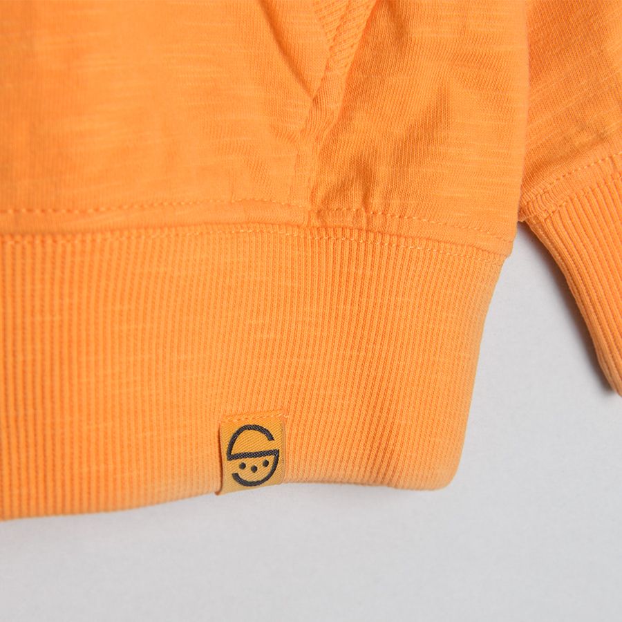 Μπλούζα μακρυμάνικη μονόχρωμη πορτοκαλί με τσέπη