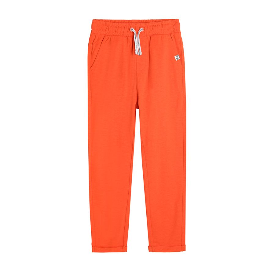 Orange jogging pants with cord