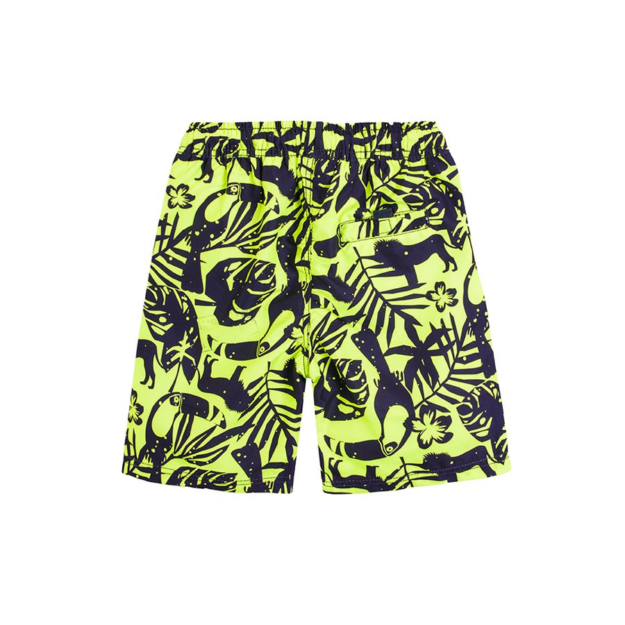 Swimming shorts with tropical leaves print
