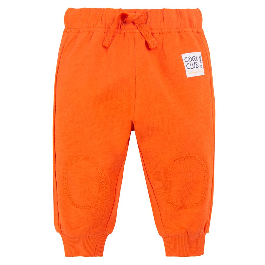 Orange jogging pants