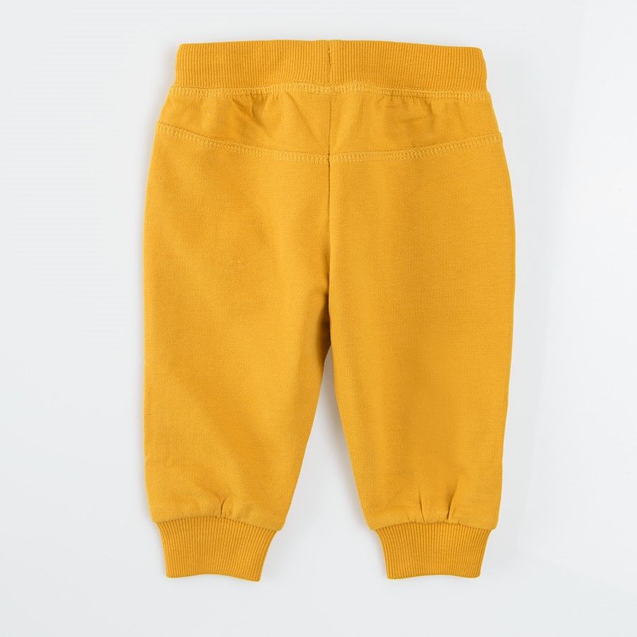 Yellow jogging pants with cord and side pockets