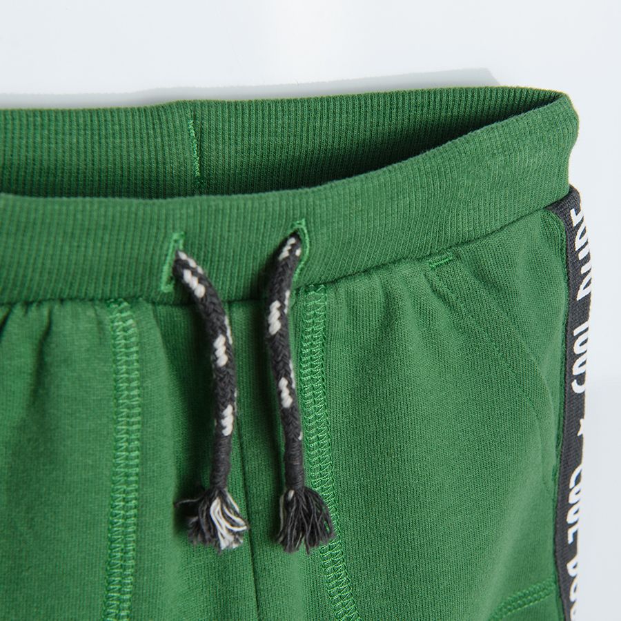 Green jogging pants