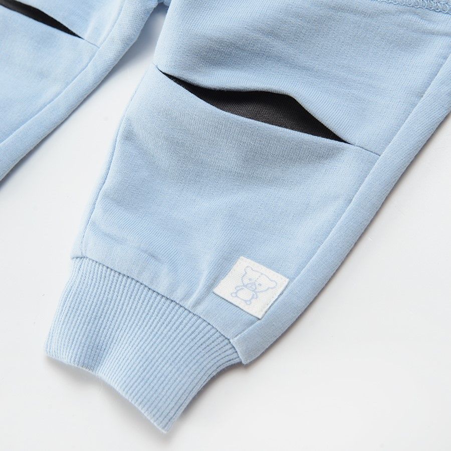 Light blue with cut on the knees jogging pants