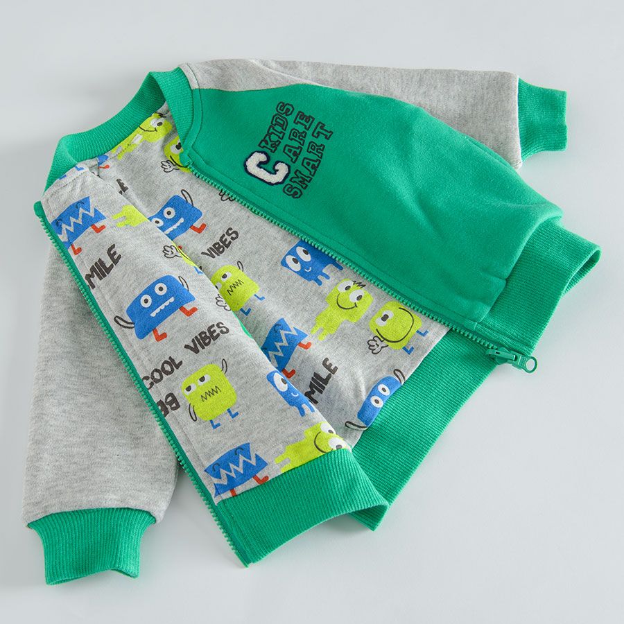 Green zip through hooded sweatshirt with animals print on the inside lining