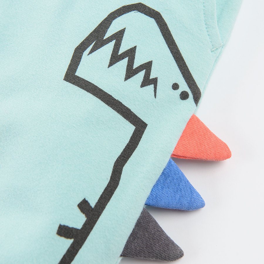 Light mint jogging pants with dinosaur print on the side and adjustable waist