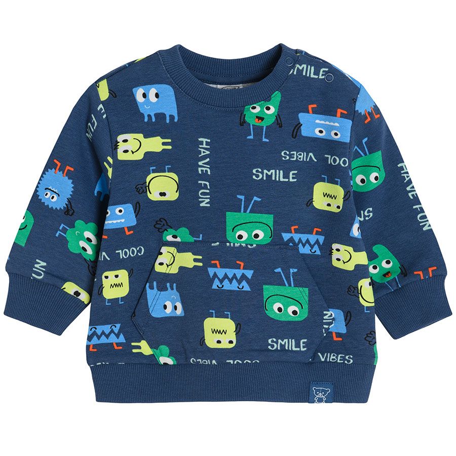 Navy blue sweatshirt with happy smiley creatures