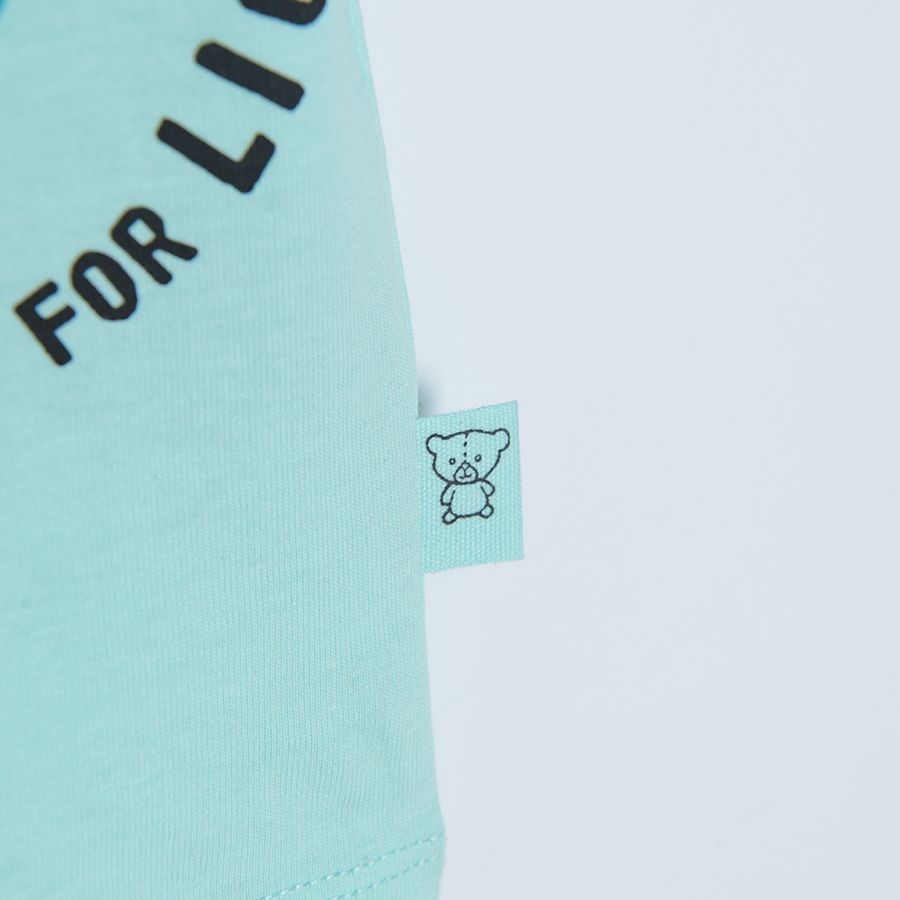 Light mint short sleeve T-shirt with lion print