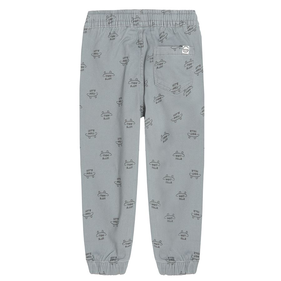 Grey trousers with adjustable waist