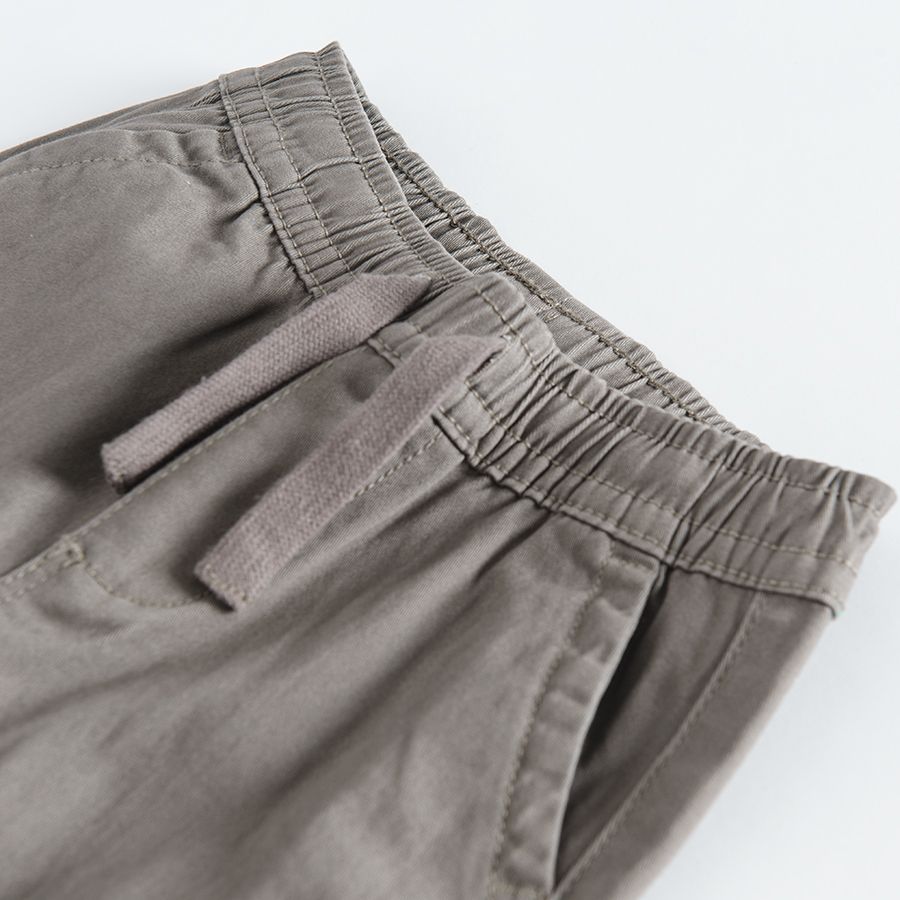 Grey trousers with adjustable waist