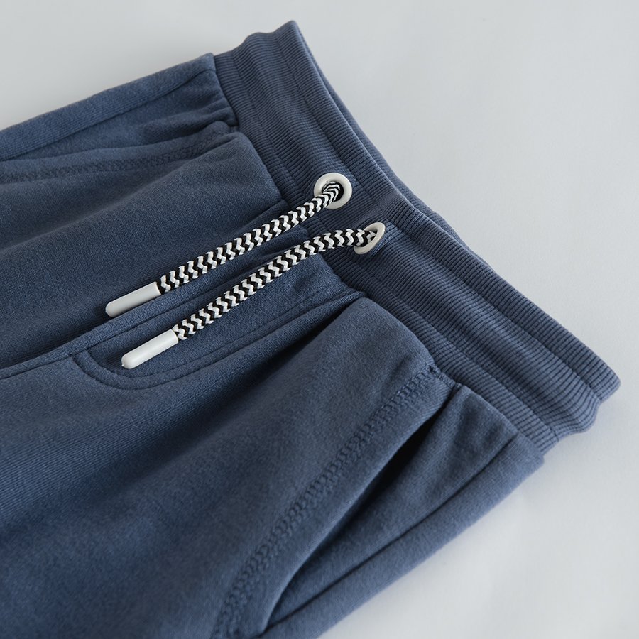 Blue jogging pants with adjustable waist