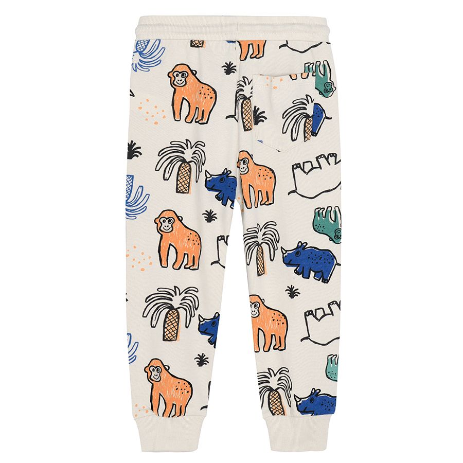 Beige jogging pants with adhustable waist and animals print