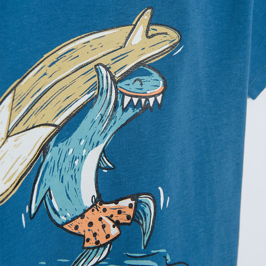 Navy blue short sleeve T-shirt with shark surfing print