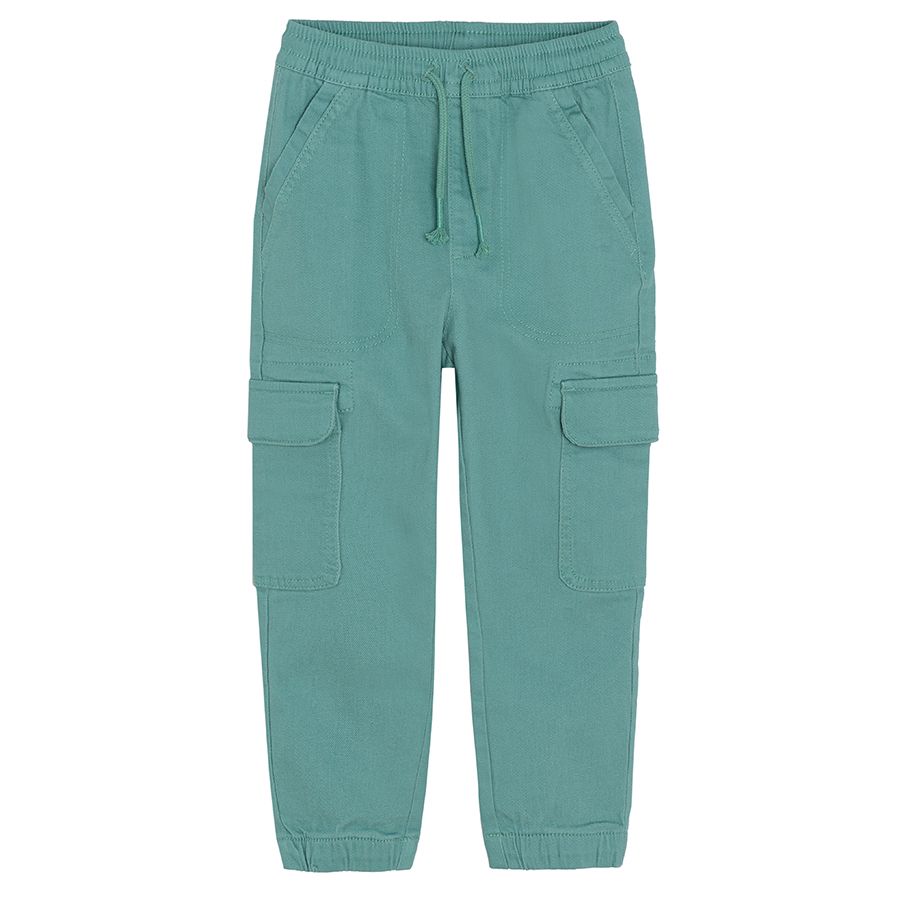 Blue trousers with adjustable waist and side pockets