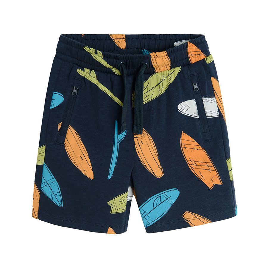 Blue shorts with surf boards print