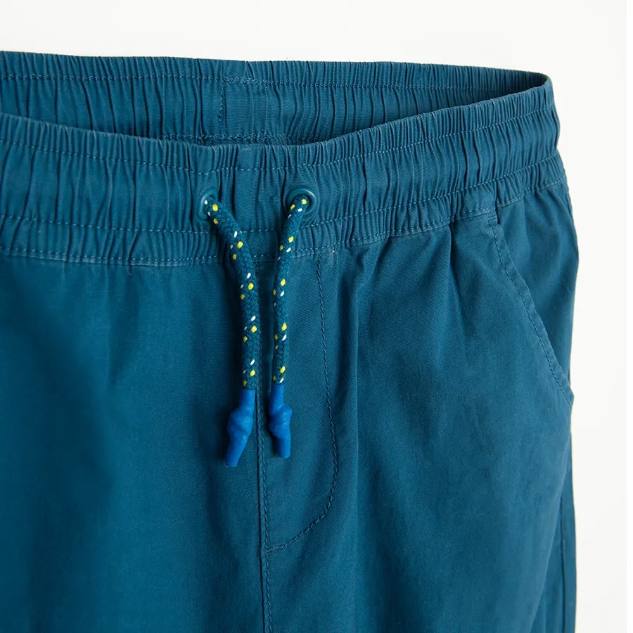 Blue trousers with adjustable waist