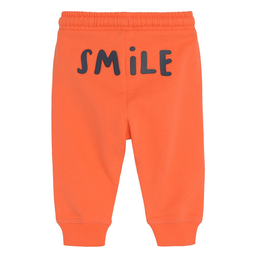 Orange jogging pants