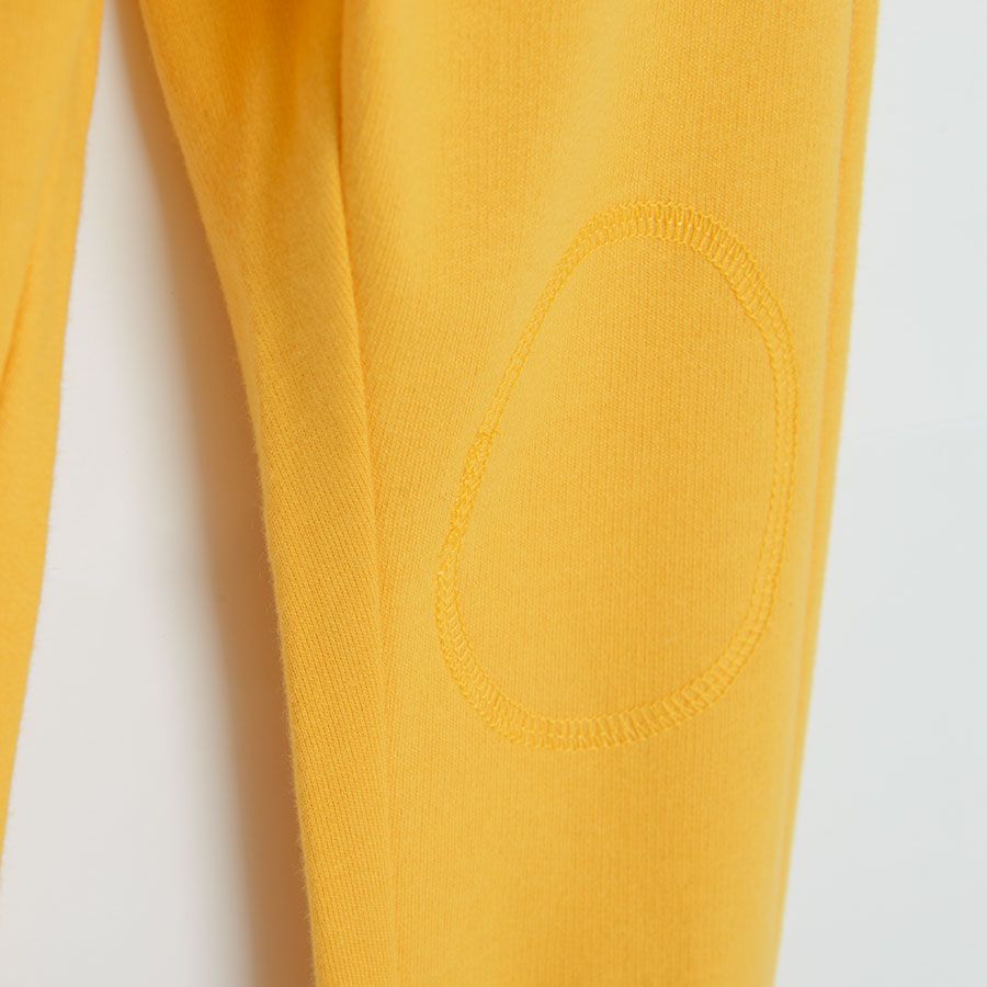 Yellow jogging pants