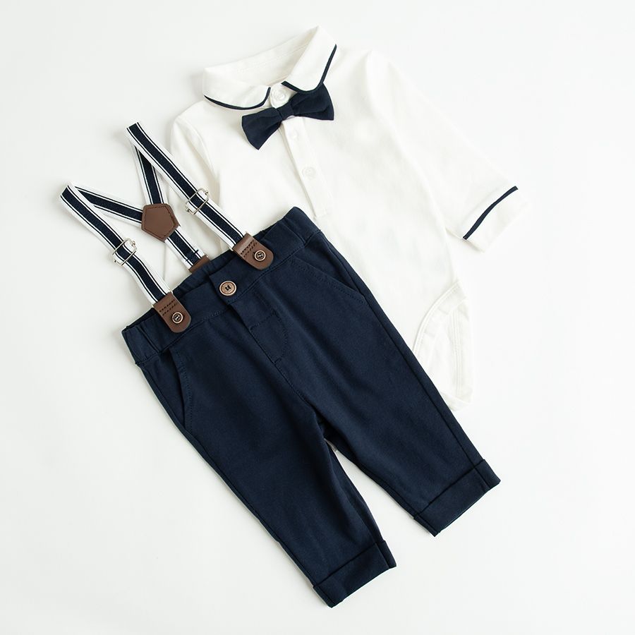 White long sleeve bodysuit with bow tie and pants with decorative suspenders
