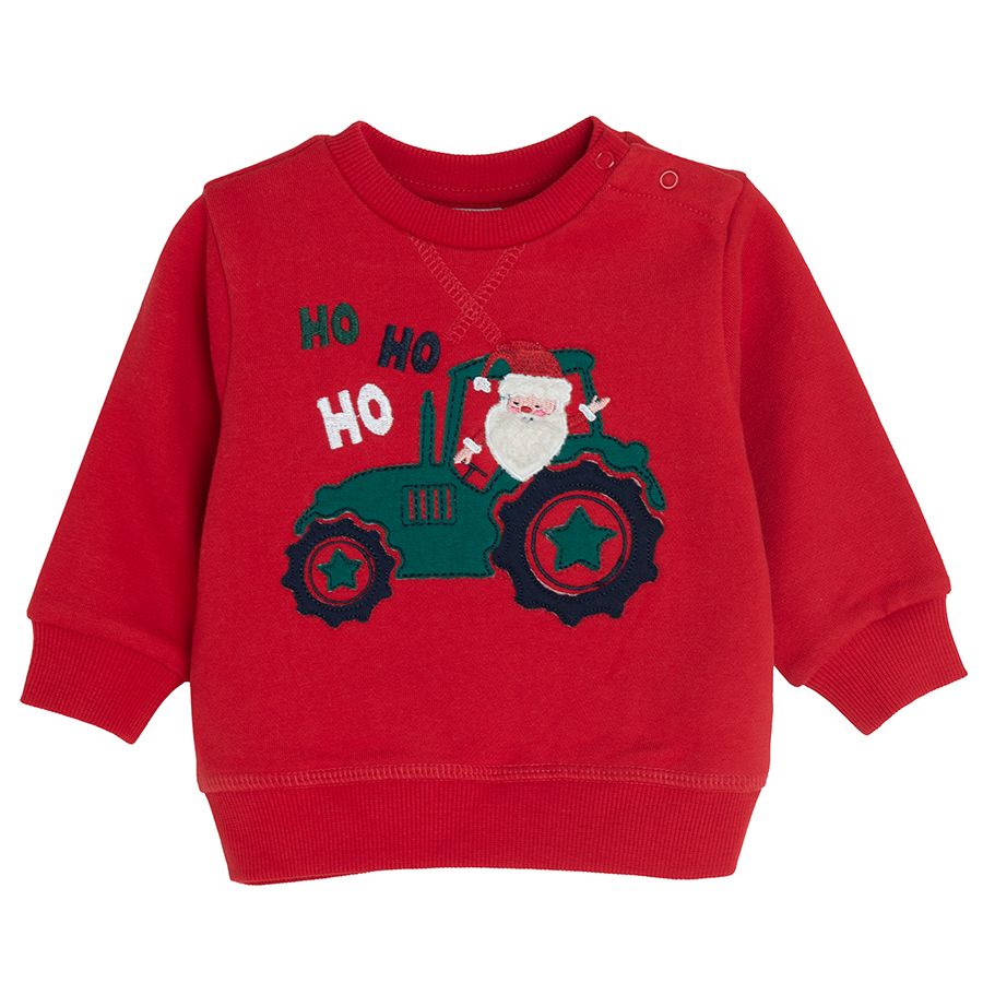 Red sweatshirt with Santa Claus on a truck print