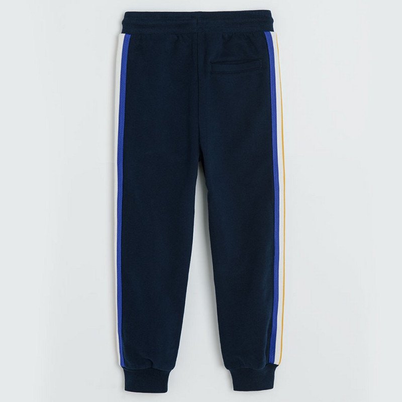 Black jogging pants with light blue, red and white stripe on the side
