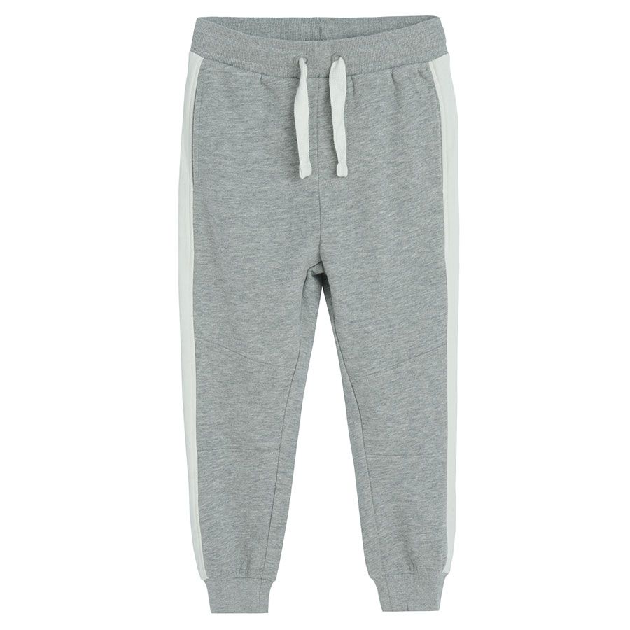Grey jogging pants with white stripe on the side
