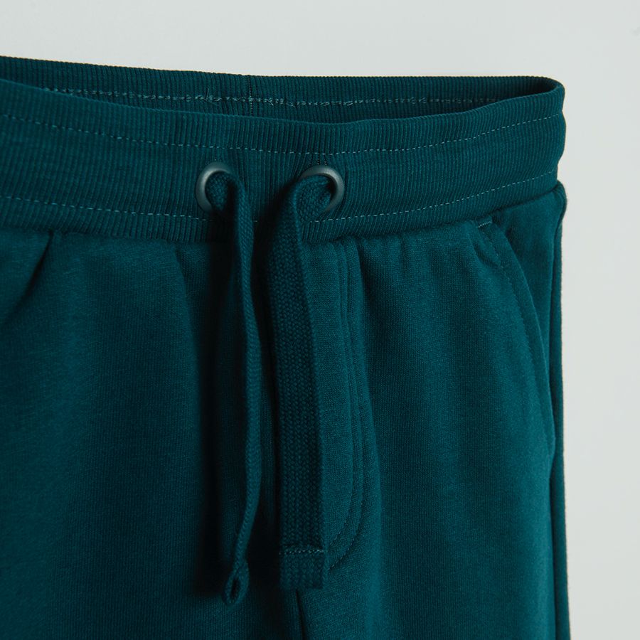 Dark green jogging pants with adjustable waist