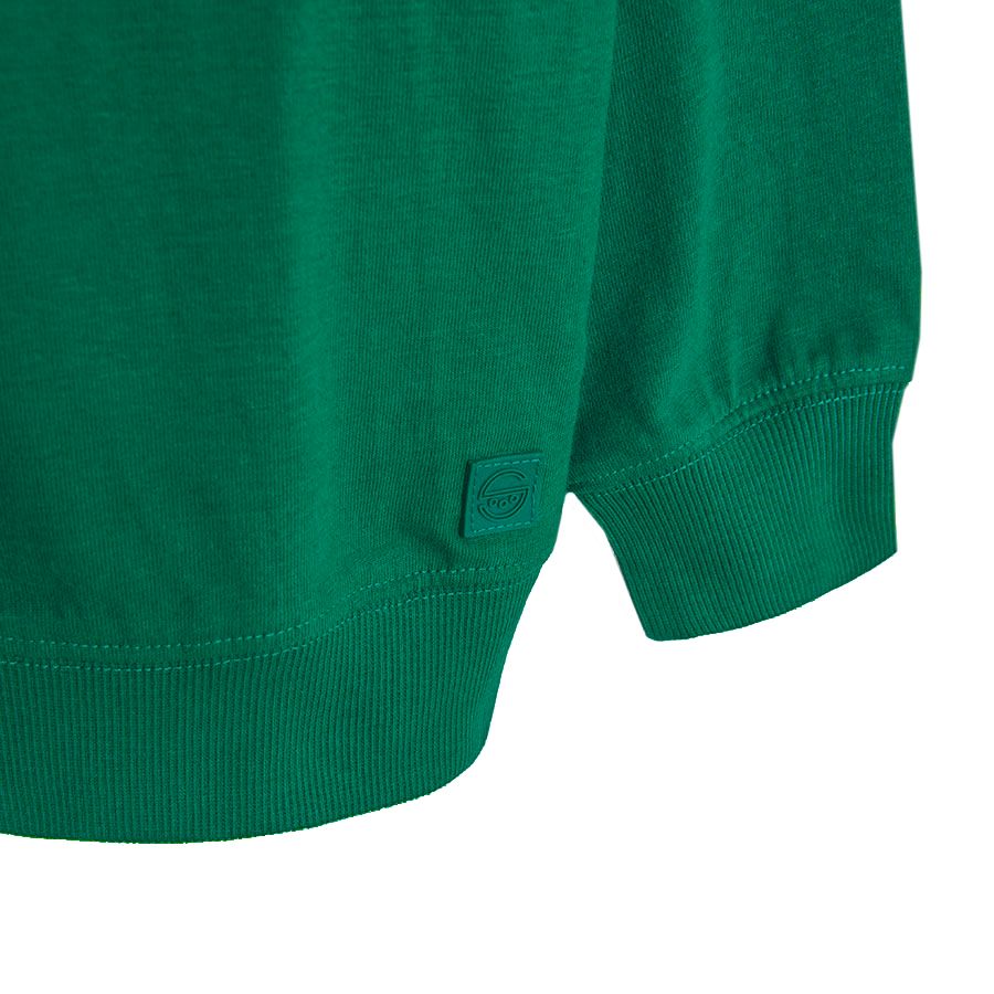Green sweatshirt with blue pocket
