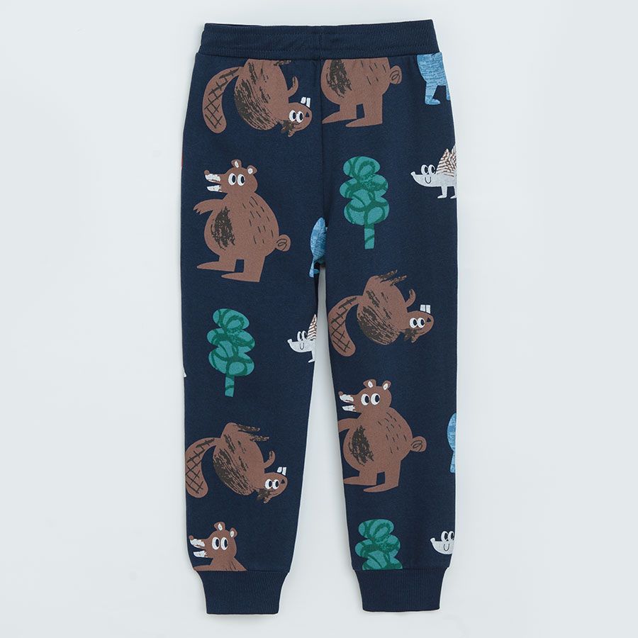 Blue jogging pants with forest animals print